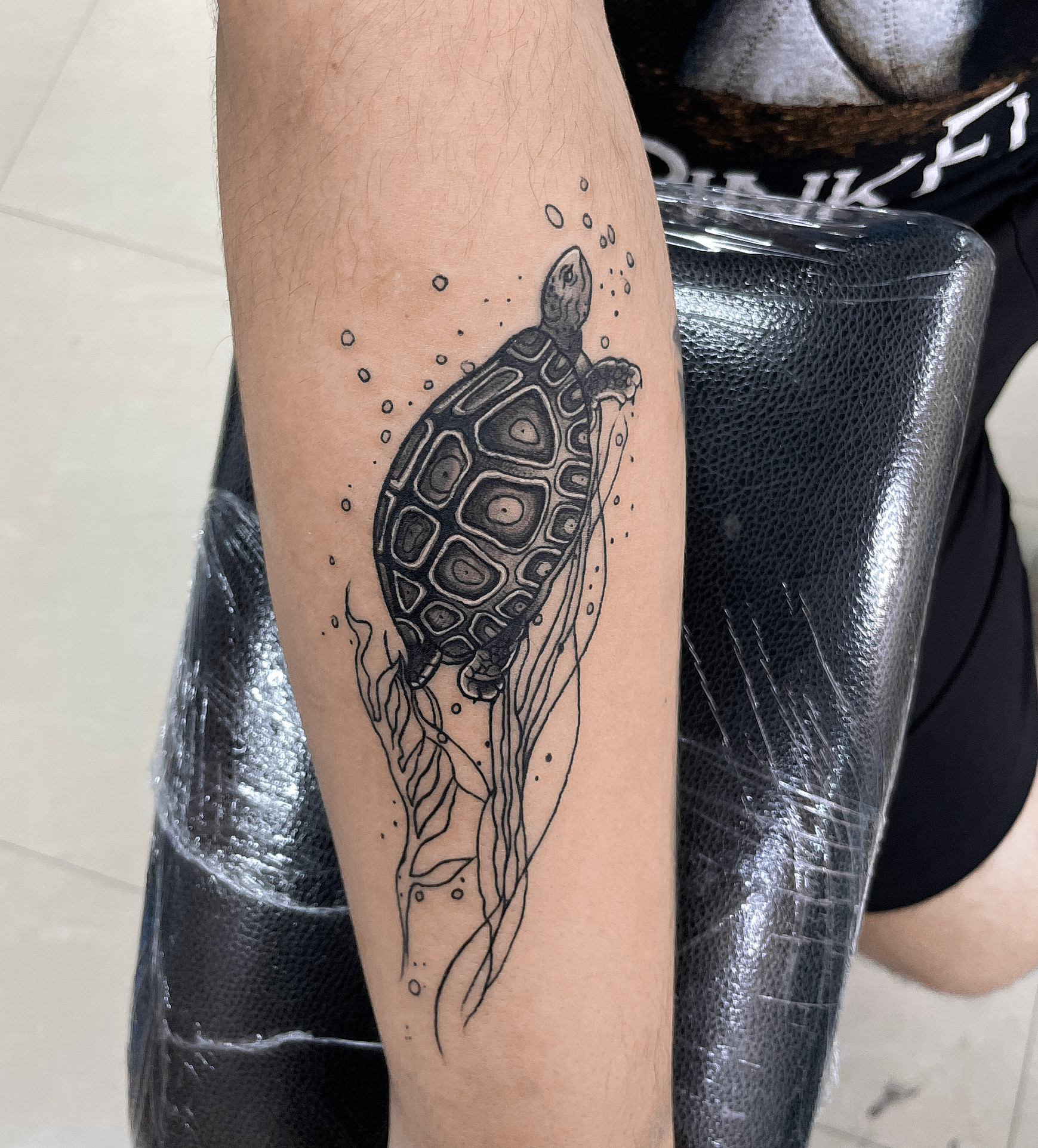 Minimal Turtle Tattoo design by Diya Tattoo Artist Kathmandu Nepal